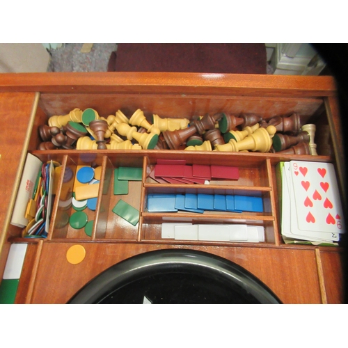 56 - A modern laminated teak effect combination games table, raised on square, tapered, cabriole legs&nbs... 