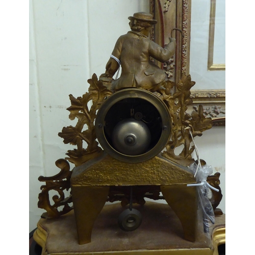 10 - An early 20thC (probably French) gilt metal mantel clock, fashioned as a figure wearing period dress... 