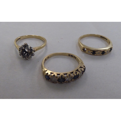 101 - Three 9ct gold rings, set with coloured stones