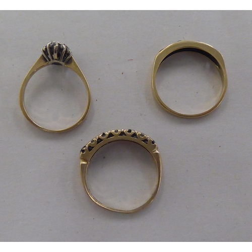 101 - Three 9ct gold rings, set with coloured stones