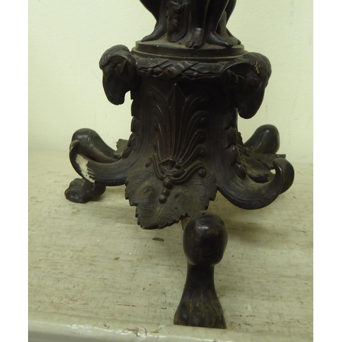 104 - A 19thC cast bronze table lamp, featuring five branches, over a central column, supported by three c... 