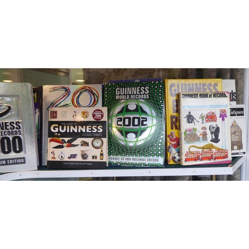 123 - An extensive collection of Guinness memorabilia: to include unopened bottles, commemorating various ... 