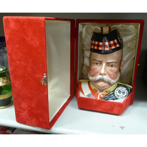 13 - A bottle of Grants 25 year old 'Very Rare Scotch Whiskey', in a Royal Doulton china William Grant ch... 