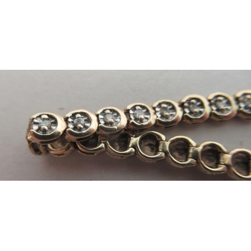 149 - A 9ct gold diamond set bracelet