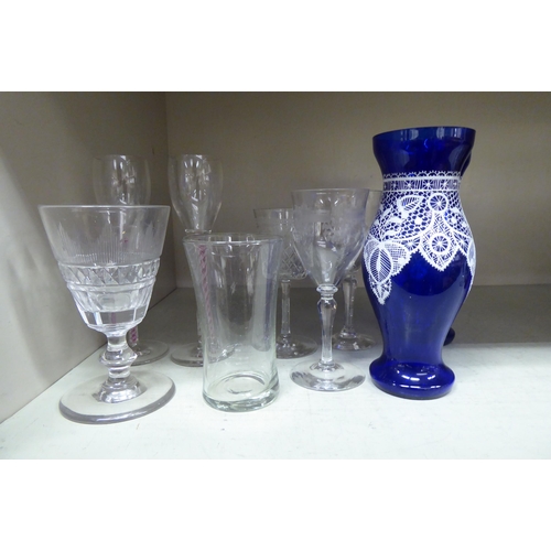 151 - Glassware: to include two cotton twist pedestal glasses 