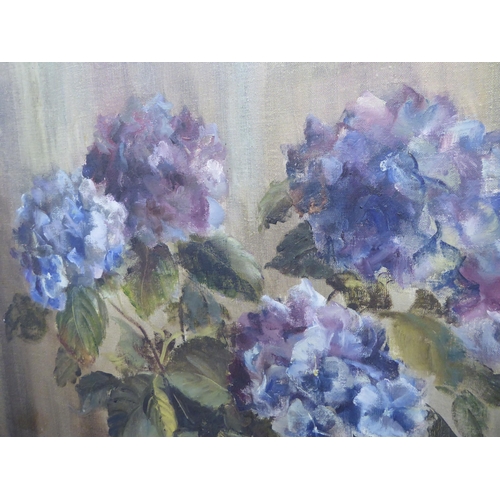 154 - Sheila Lutley - a still life study, mixed flowers in a vase  oil on canvas  bears a signat... 