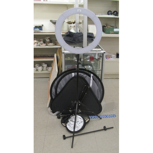 159 - Studio lighting equipment: to include a height adjustable ring light, on a tripod base  