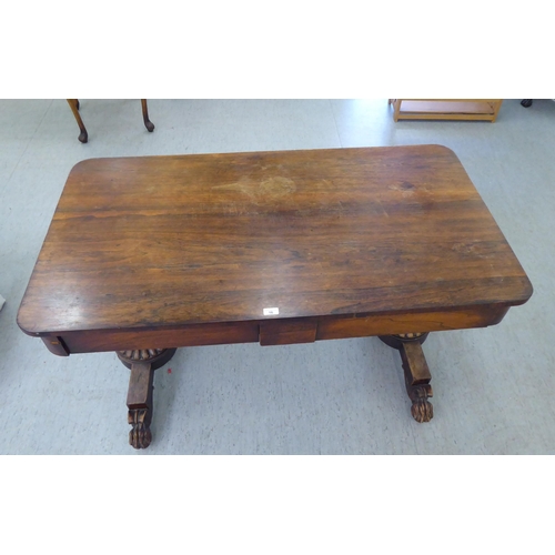 16 - A William IV rosewood centre table with two frieze drawers, raised on opposing fluted pillar support... 