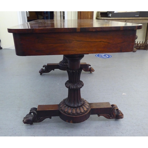 16 - A William IV rosewood centre table with two frieze drawers, raised on opposing fluted pillar support... 