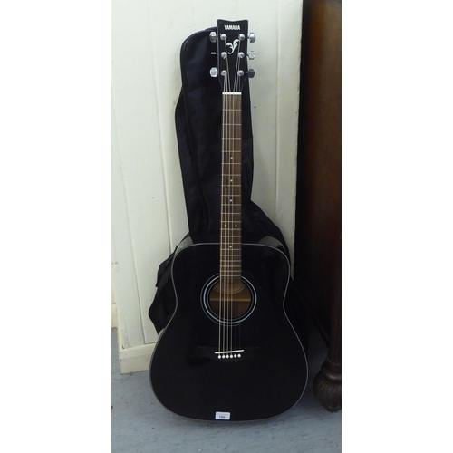 166 - A Yamaha six string F-340 BL accoustic guitar, in a sleeve 