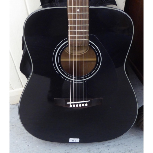 166 - A Yamaha six string F-340 BL accoustic guitar, in a sleeve 