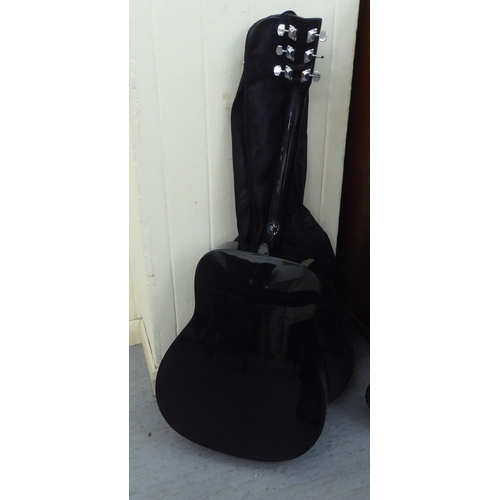 166 - A Yamaha six string F-340 BL accoustic guitar, in a sleeve 