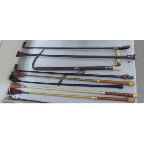 183 - Eight various riding crops: to include three with silver mounts