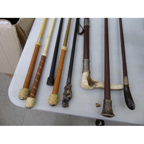 183 - Eight various riding crops: to include three with silver mounts