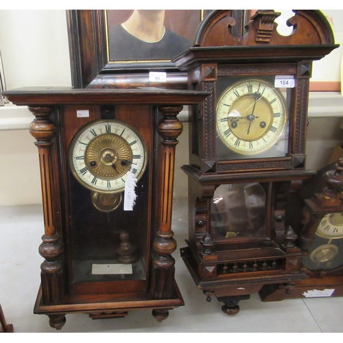 184 - Three late 19thC walnut cased clocks: to include a drop dial example; the 8 day movement faced by a ... 