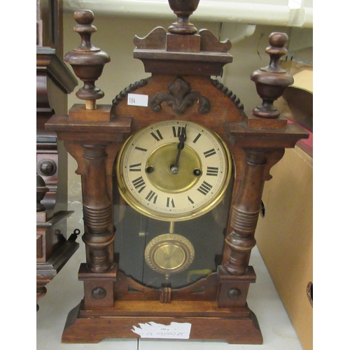 184 - Three late 19thC walnut cased clocks: to include a drop dial example; the 8 day movement faced by a ... 