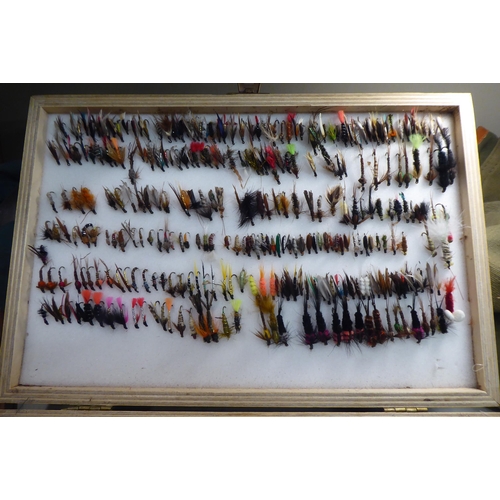 185 - Fly fishing equipment, comprising reels, lines and numerous boxed flies