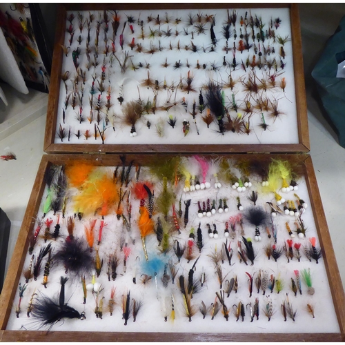 185 - Fly fishing equipment, comprising reels, lines and numerous boxed flies