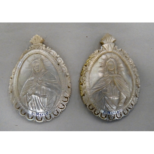 199 - Two mother-of-pearl religious themed pendants  3