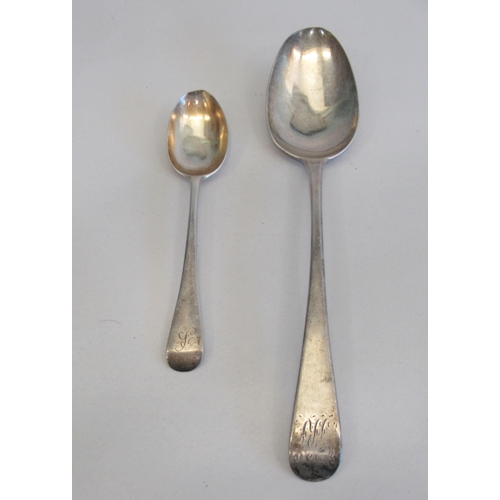 206 - A George III and later silver Old English pattern tablespoon and teaspoon  London 1810 and 1884