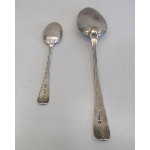 206 - A George III and later silver Old English pattern tablespoon and teaspoon  London 1810 and 1884