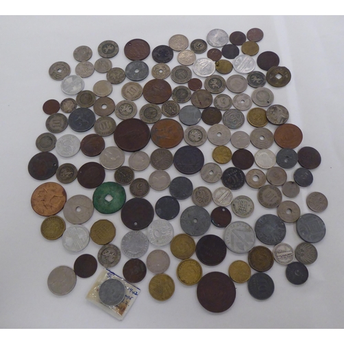 216 - Uncollated coins: to include a 1936 American silver dime 