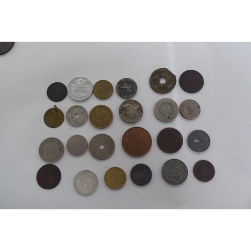 216 - Uncollated coins: to include a 1936 American silver dime 