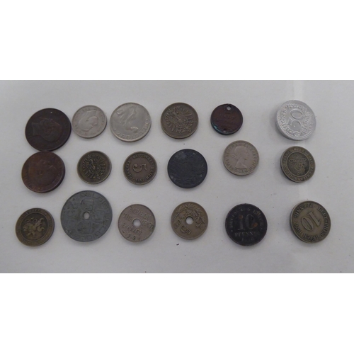 216 - Uncollated coins: to include a 1936 American silver dime 