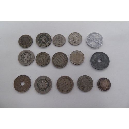 216 - Uncollated coins: to include a 1936 American silver dime 