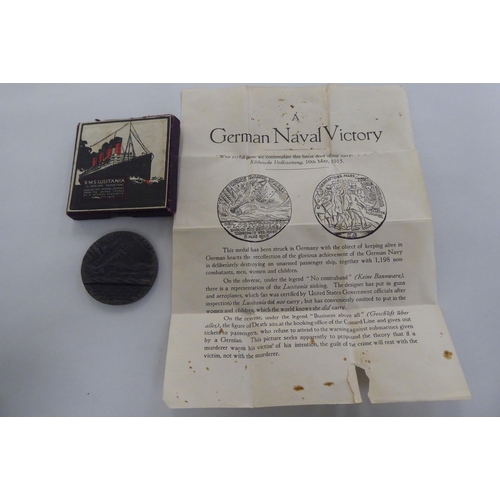 219 - Coins, medallions and medals: to include an RMS Lusitania bronze medallion  boxed 