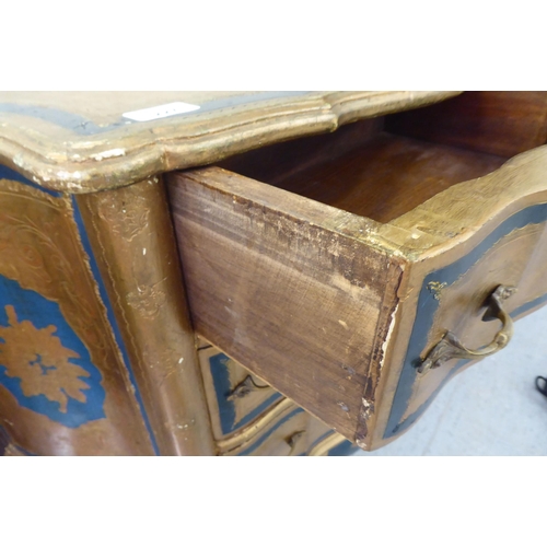 227 - A modern Italianate, painted and gilded chest of three drawers, raised on cabriole legs  29