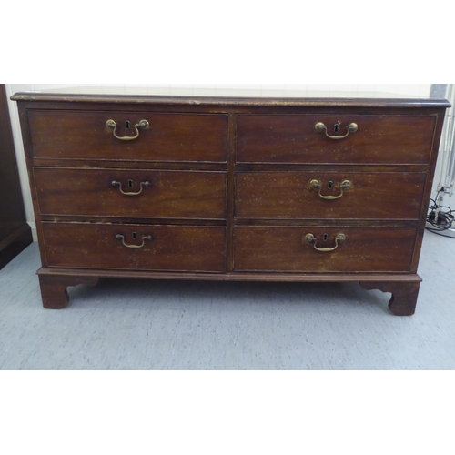 234 - A George III mahogany six drawer estate chest, raised on bracket feet  26