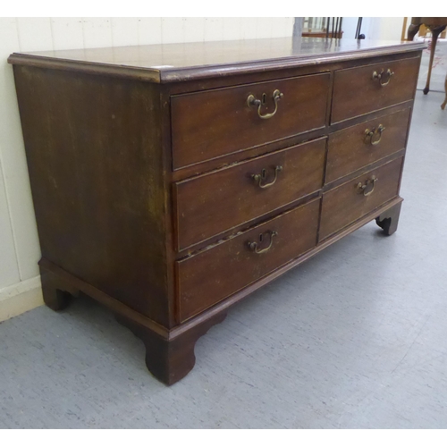 234 - A George III mahogany six drawer estate chest, raised on bracket feet  26