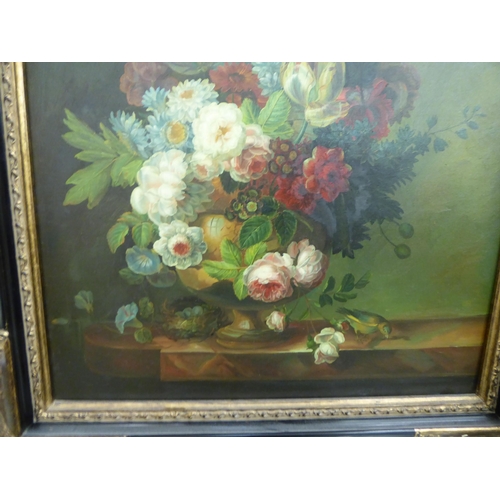 256 - 20thC Continental School - a still life study, mixed flowers, in a vase with a hedgerow bird, on a l... 