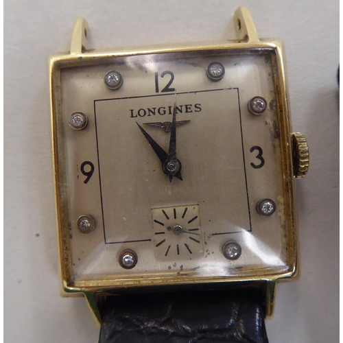 268 - A gold coloured metal cased Longines wristwatch, faced by a diamond set and Arabic dial with subsidi... 