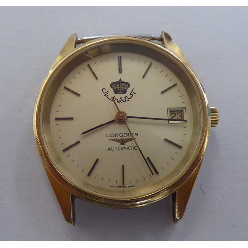 269 - A Cal:1990.1 gold plated and stainless steel cased wristwatch, faced by a Hussen of Jordan baton dia... 