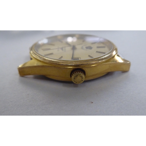 269 - A Cal:1990.1 gold plated and stainless steel cased wristwatch, faced by a Hussen of Jordan baton dia... 