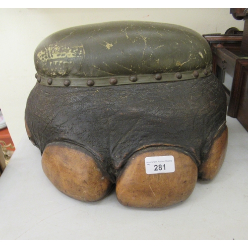 281 - An elephant foots footstool with a stud upholstered cushioned top  16