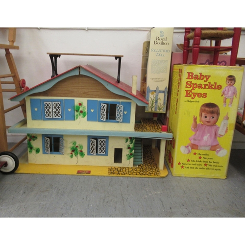 35 - 20thC juvenilia: to include a Thumbelina doll; and a doll's house with furniture