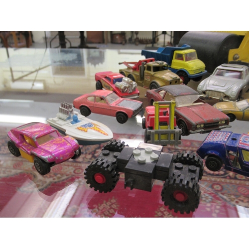 59 - Toys, mainly diecast model vehicles: to include a Tonka roller and a Tonka Beetle