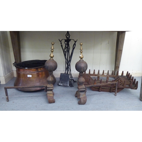 6 - Hearth related items: to include a late Victorian cast iron fire basket; and a matching pair of and ... 