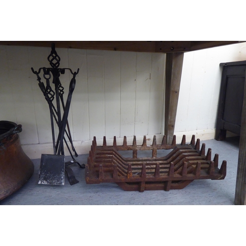 6 - Hearth related items: to include a late Victorian cast iron fire basket; and a matching pair of and ... 