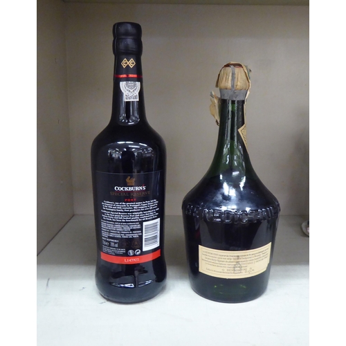 63 - A bottle of Cockburns Special Reserve Port; and a bottle of D.O.M Benedictine