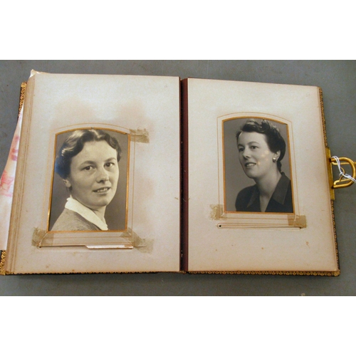 67 - A late Victorian photograph album, containing family groups