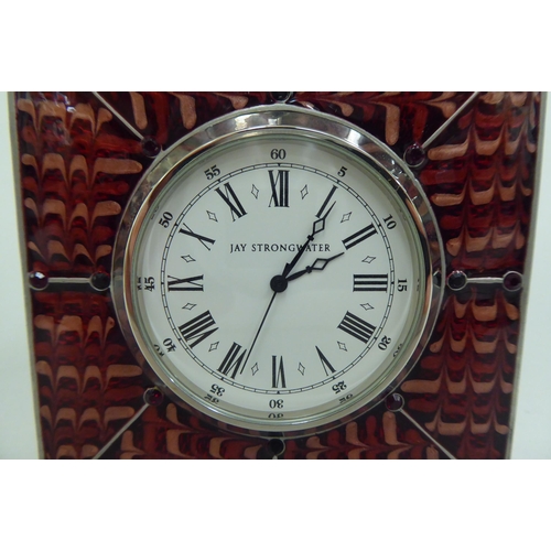 69 - A Jay Strongwater red enamelled mantel clock; faced by a white Roman dial  3