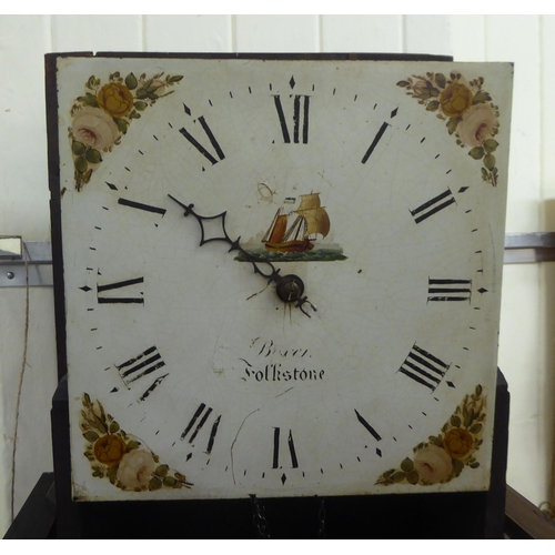 70 - An early 19thC mahogany longcase clock; the bell strike, weight driven movement faced by a painted R... 