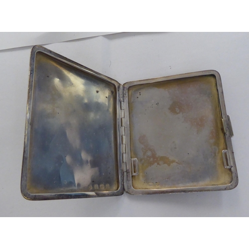 72 - Silver collectables: to include an engine turned folding cigarette case  indistinct Birmingham marks