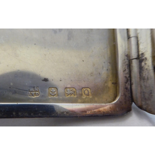 72 - Silver collectables: to include an engine turned folding cigarette case  indistinct Birmingham marks