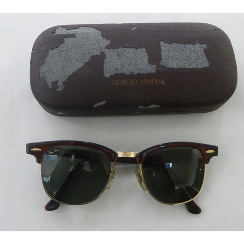 55 - A pair of Bausch & Lomb, Ray-Ban sunglasses (with prescription lenses)