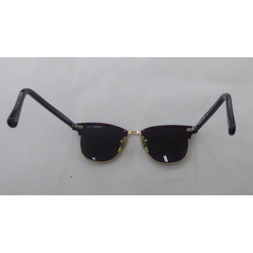 55 - A pair of Bausch & Lomb, Ray-Ban sunglasses (with prescription lenses)